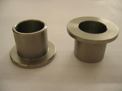 ttr-rear-shock-top-mount-spacers-005.jpg and 