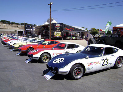 Toyota_2000GT_at_Laguna_Seca_by_Partywave.jpg and 