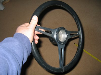 26r-steer-wheel-2.jpg and 