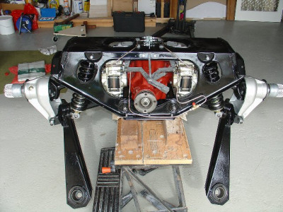 1963_Jaguar_E-Type_rear_subframe_front_view.jpg and 